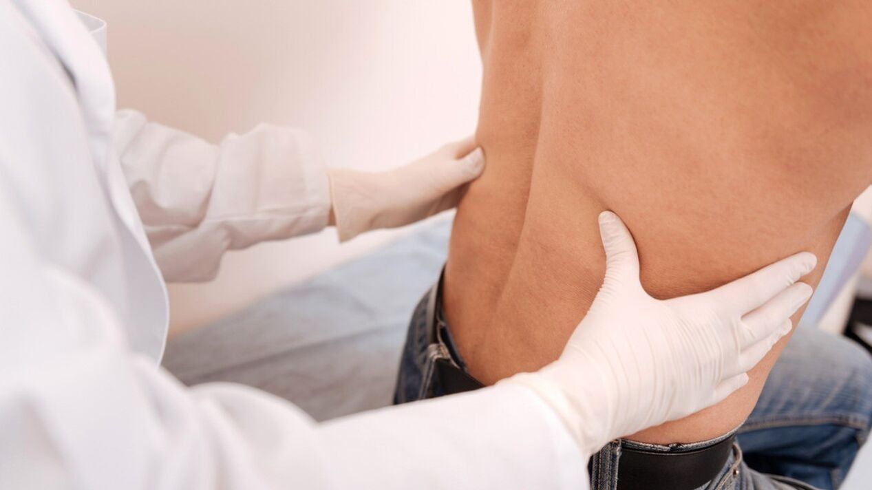 Examen initial d'un patient souffrant de lombalgie